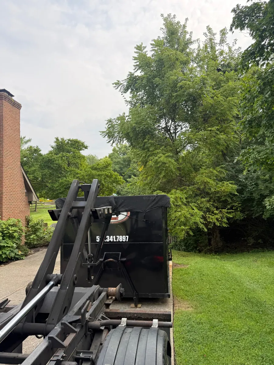 Clutter Cleanout 20 yard dumpster CC-205 tarped on a driveway in West Chester, OH