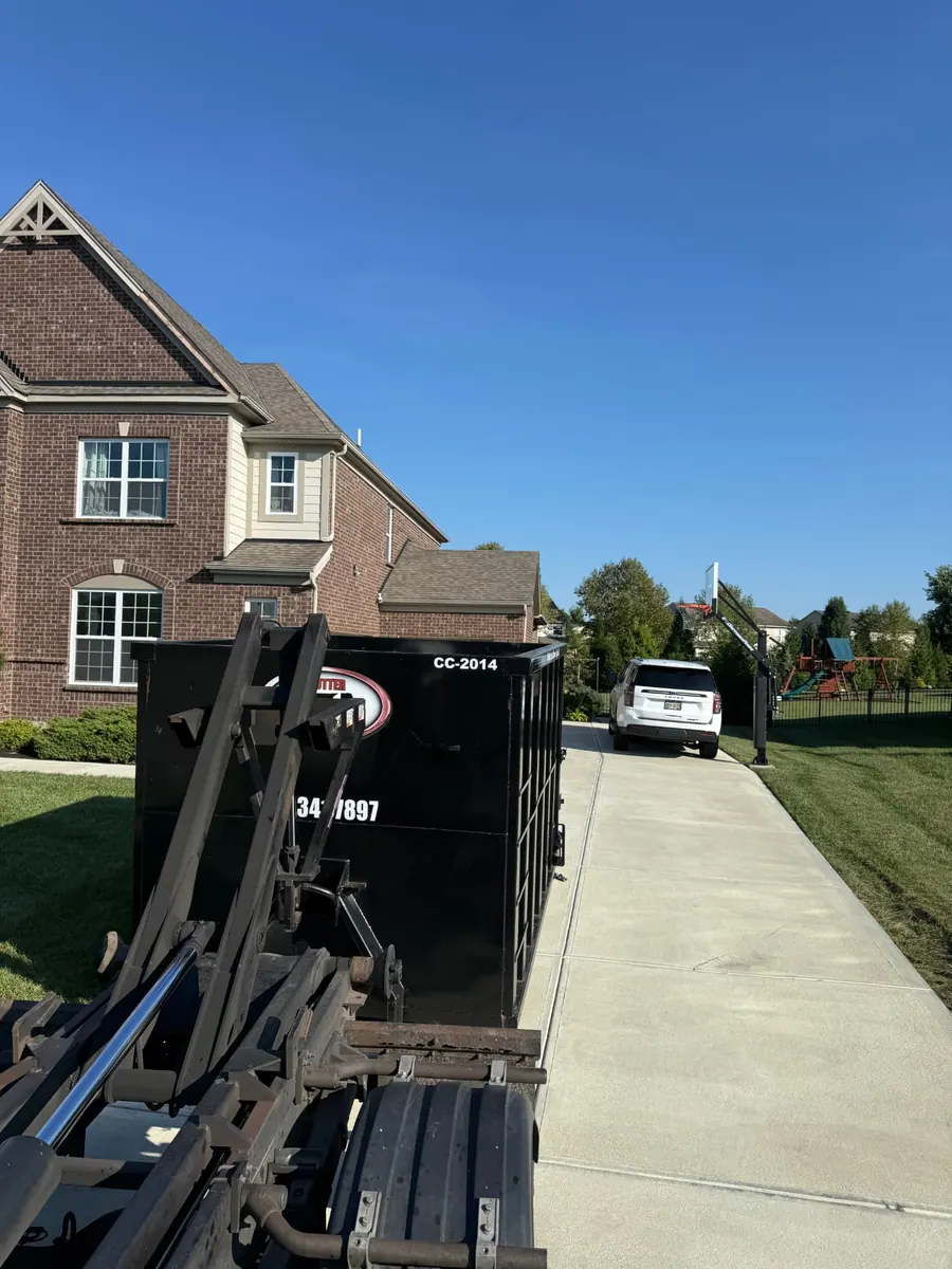 Clutter Cleanout 20 yard dumpster CC-2014 delivered to a residential driveway in Mason OH
