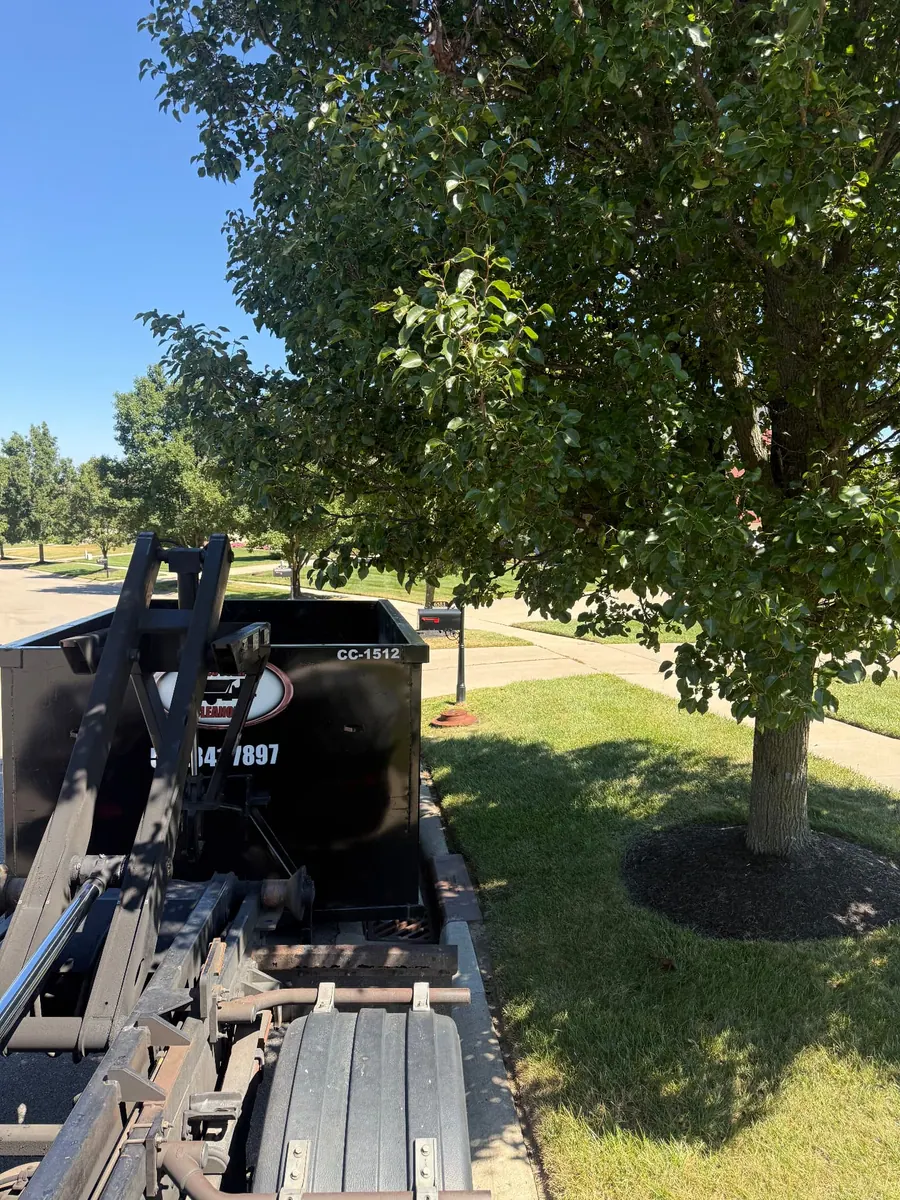 Clutter Cleanout 15 yard dumpster CC-1512 delivered on a residential driveway in Mason OH