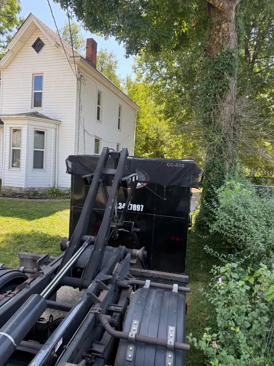 Clutter Cleanout 20 yard dumpster CC-208 delivered beside a home in Mariemont, OH