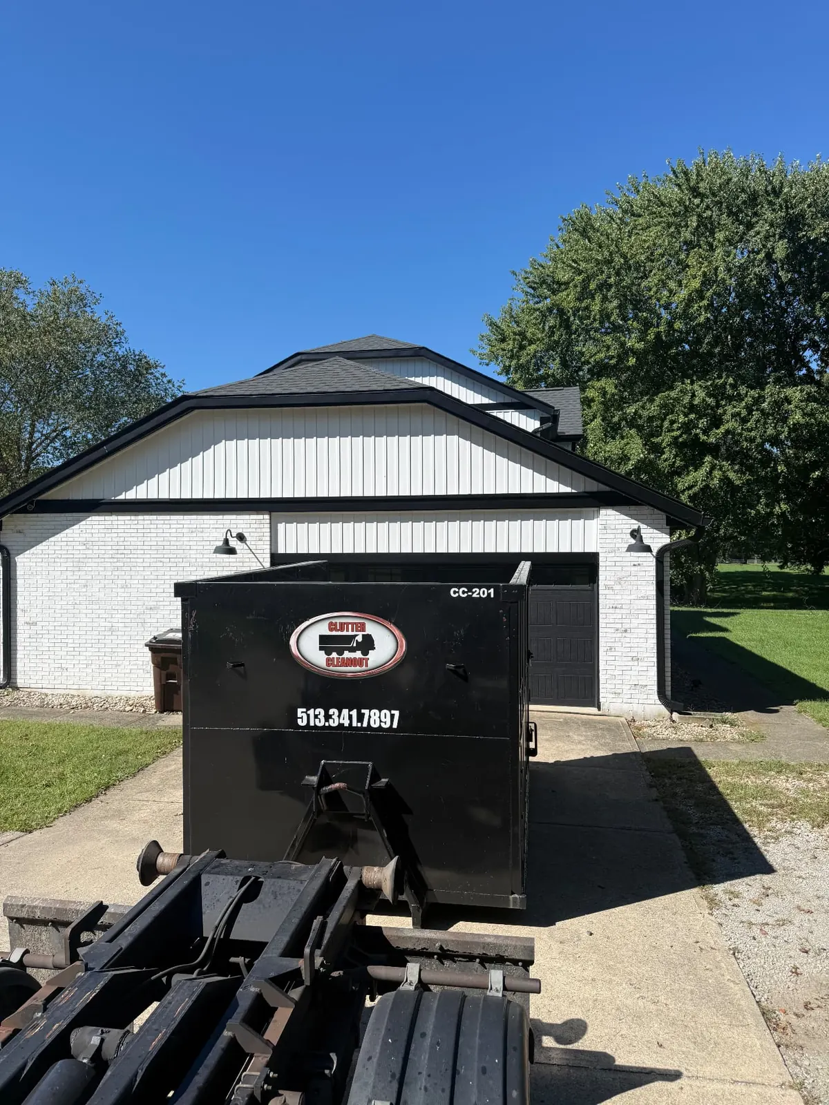 Clutter Cleanout 20 yard dumpster CC-201 delivered to a residential driveway in Mason, OH