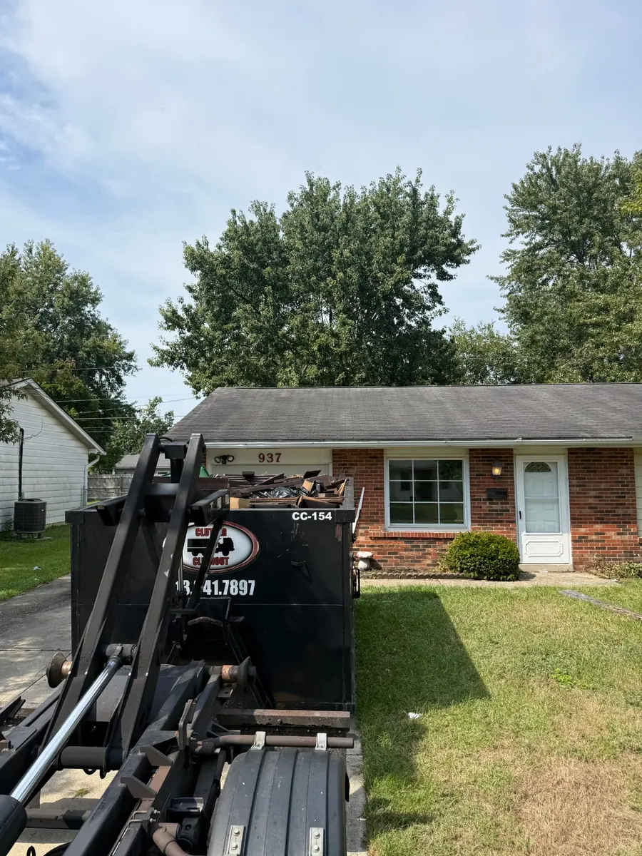 Clutter Cleanout 15 yard dumpster CC-154 loaded during a residential cleanout in Mason OH
