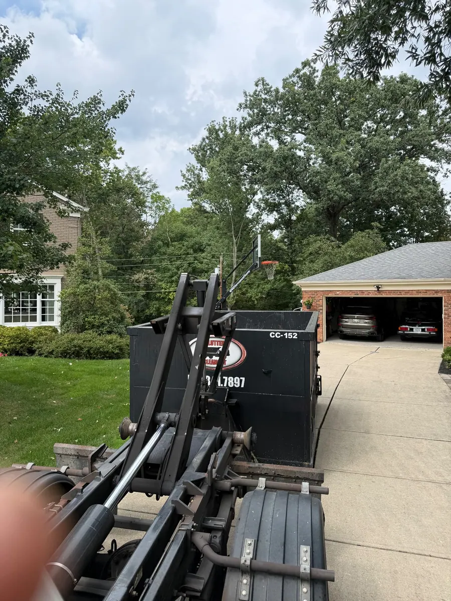 Clutter Cleanout 15 yard dumpster CC-152 delivered on a residential driveway in Anderson Township OH