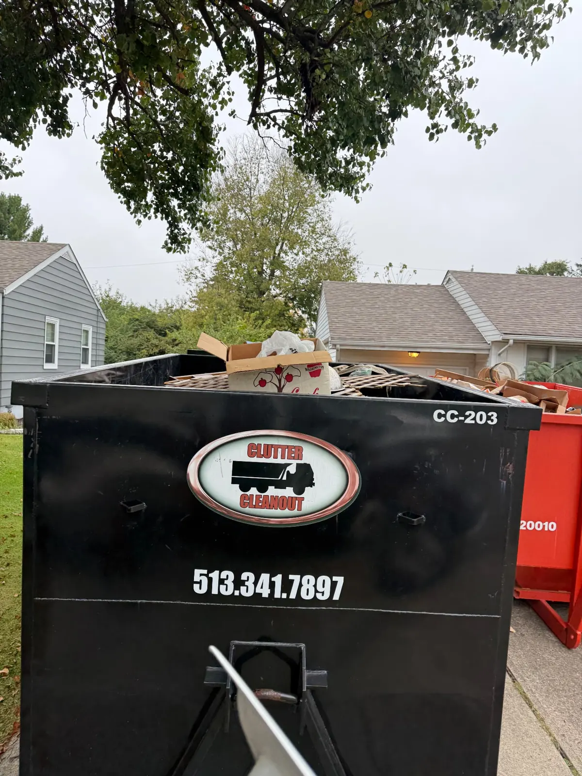 Clutter Cleanout 20 yard dumpster CC-203 loaded with household cleanout debris in Cincinnati, OH