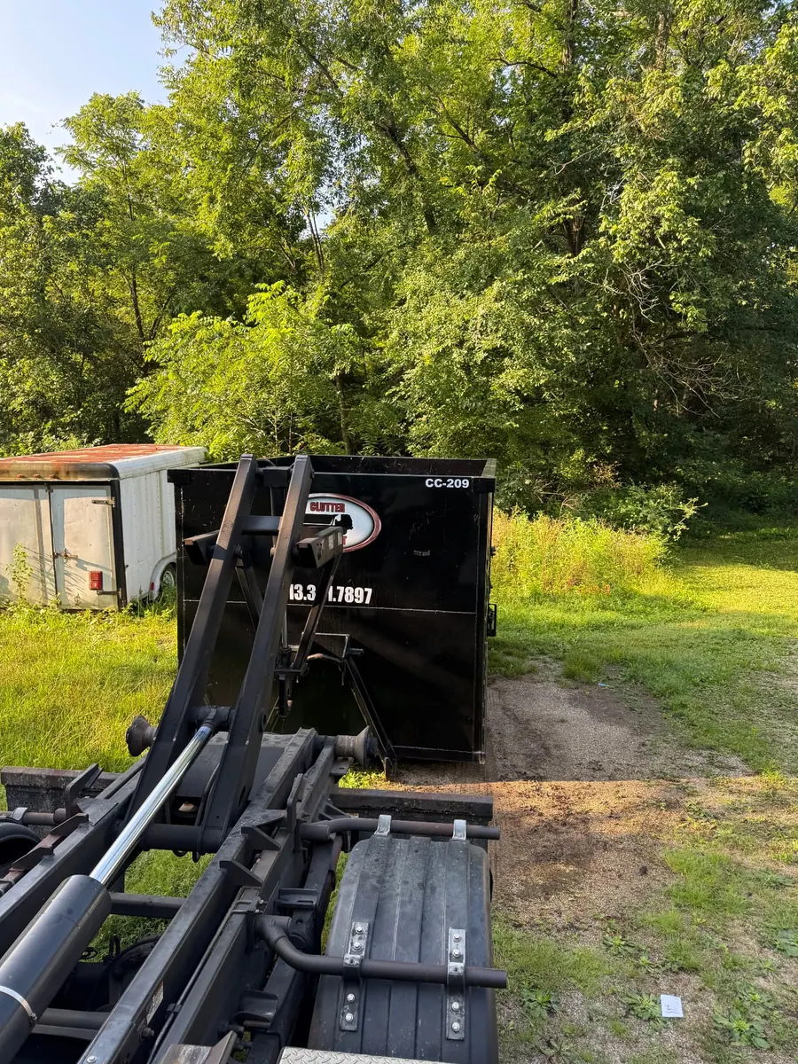Clutter Cleanout 20 yard dumpster CC-209 set on a gravel pad in Anderson Township, OH