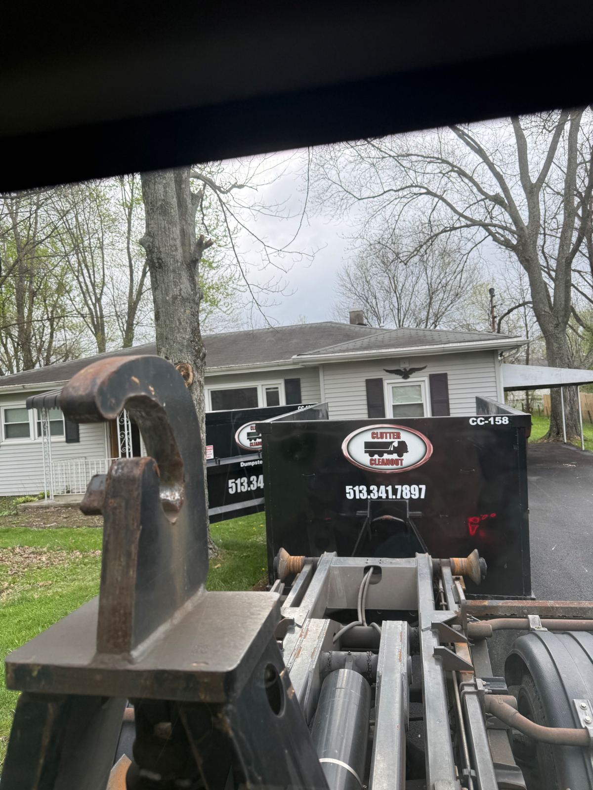 Clutter Cleanout dumpster delivery to a Covington KY residential neighborhood