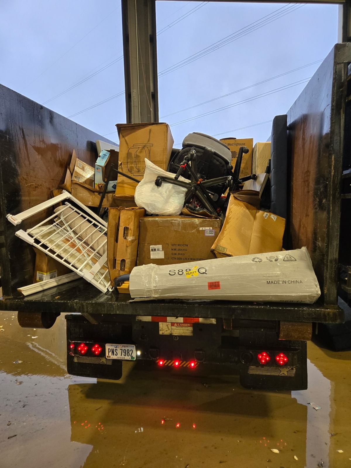 Loaded dumpster with junk from Burlington KY cleanout project