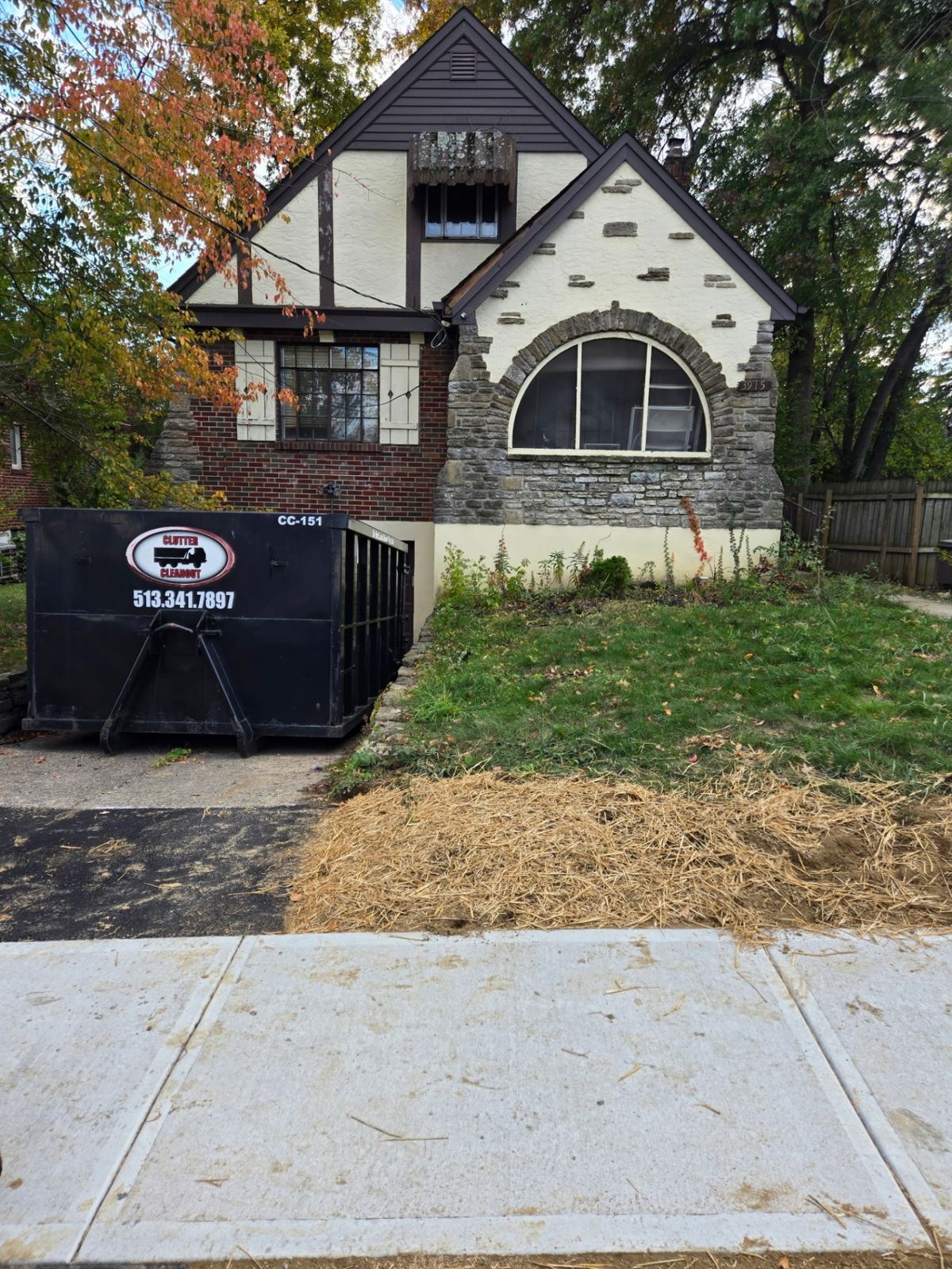 Clutter Cleanout dumpster rental delivered to Covington KY home for cleanout