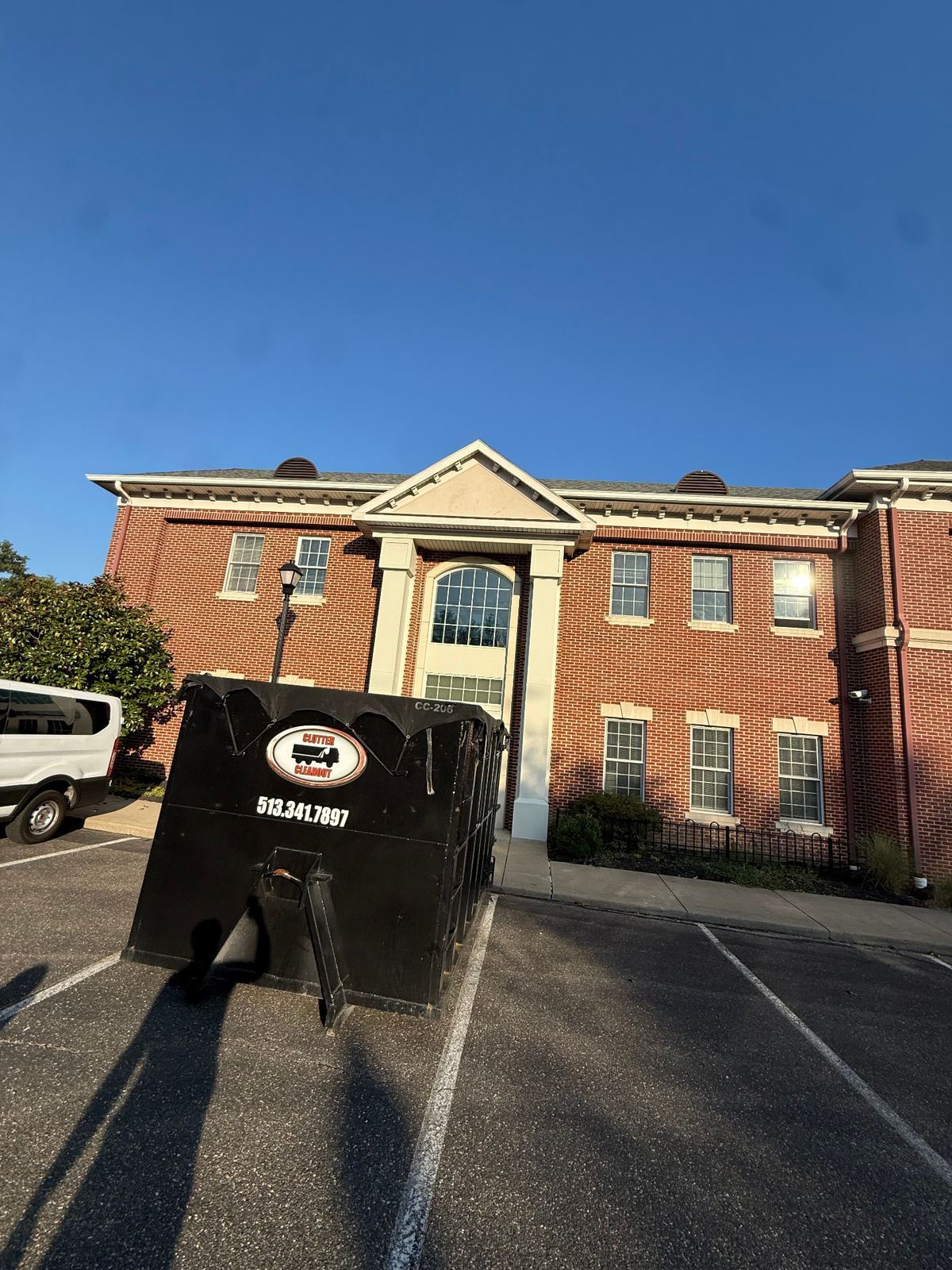 Clutter Cleanout dumpster rental at Crescent Springs KY office building for commercial cleanout