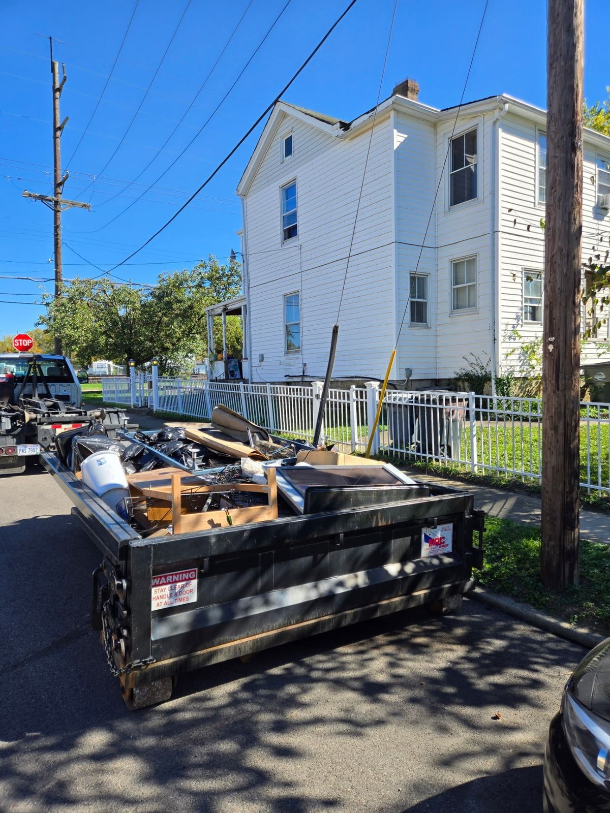 Clutter Cleanout dumpster rental in Erlanger KY filled with household debris