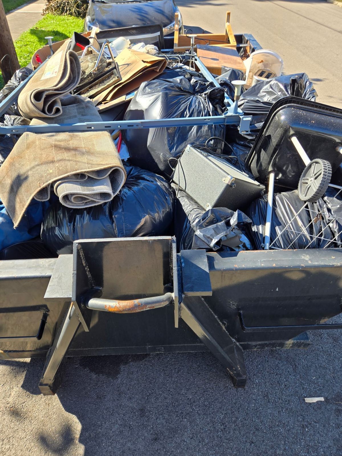 Overflowing dumpster from Erlanger KY home cleanout project