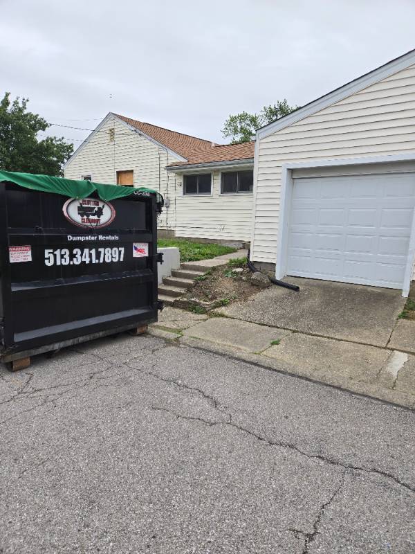 20-yard Clutter Cleanout dumpster on driveway of a Fort Mitchell KY home for a full house cleanout