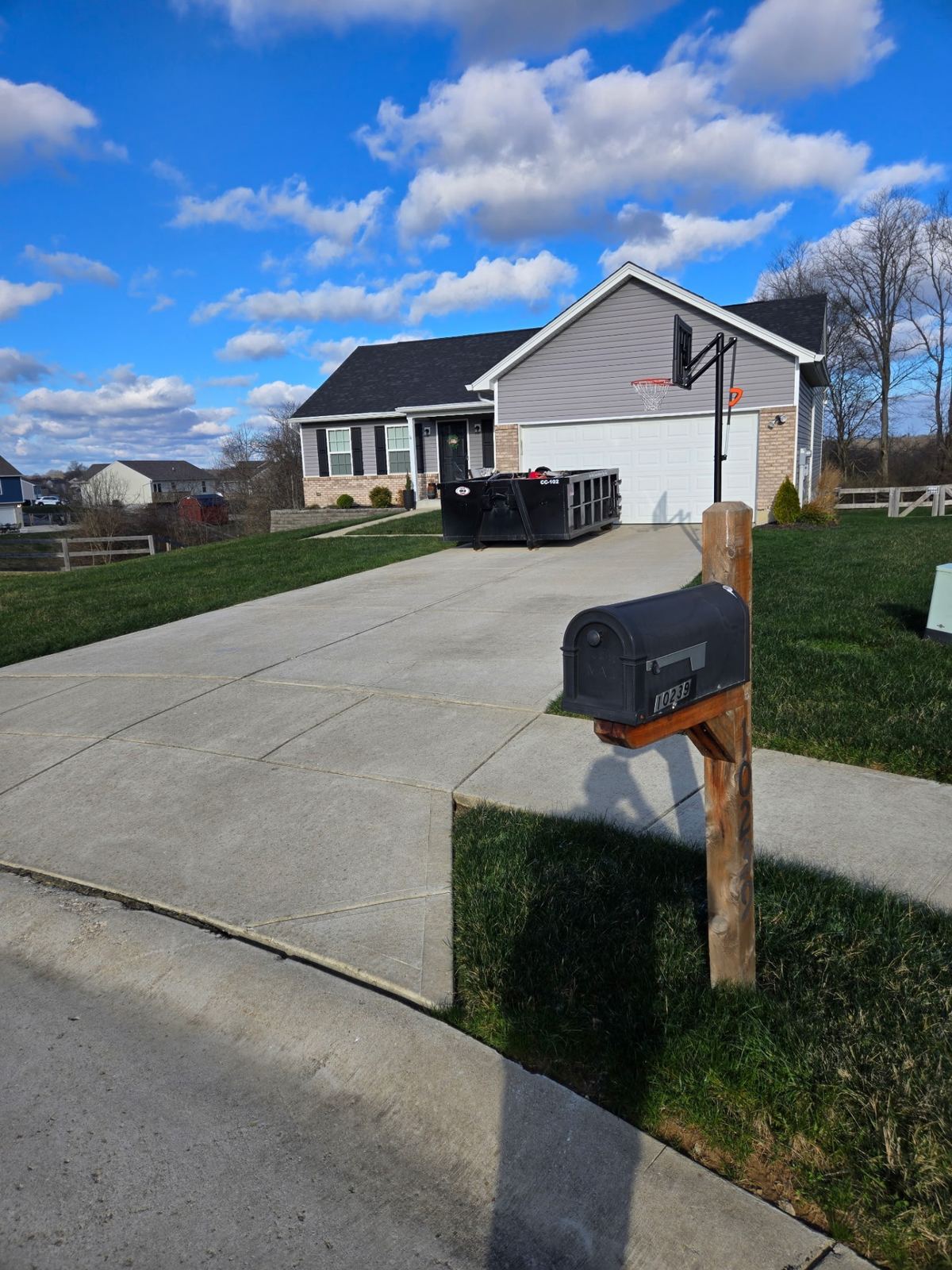 Dumpster rental delivered to Independence KY home for garage cleanout