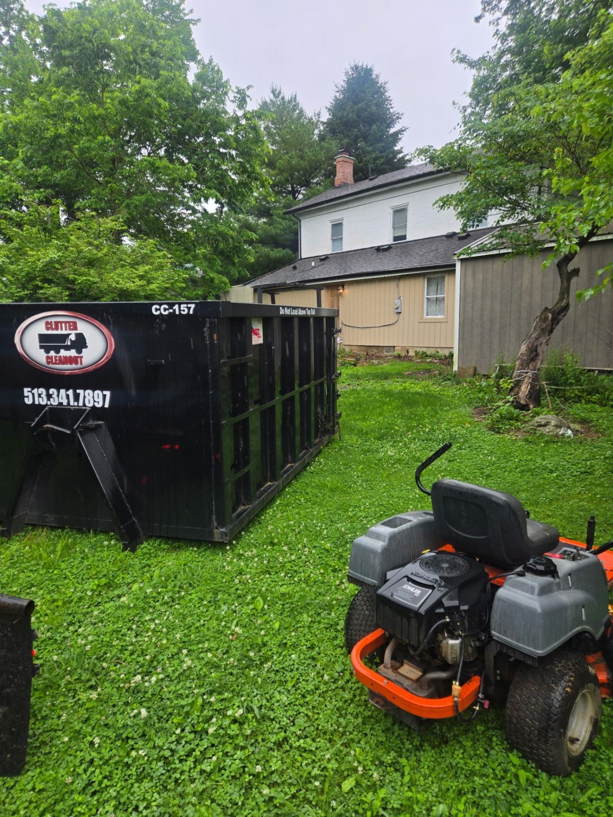 Clutter Cleanout 15 yard dumpster CC-157 placed in a Lebanon OH backyard for a property cleanout