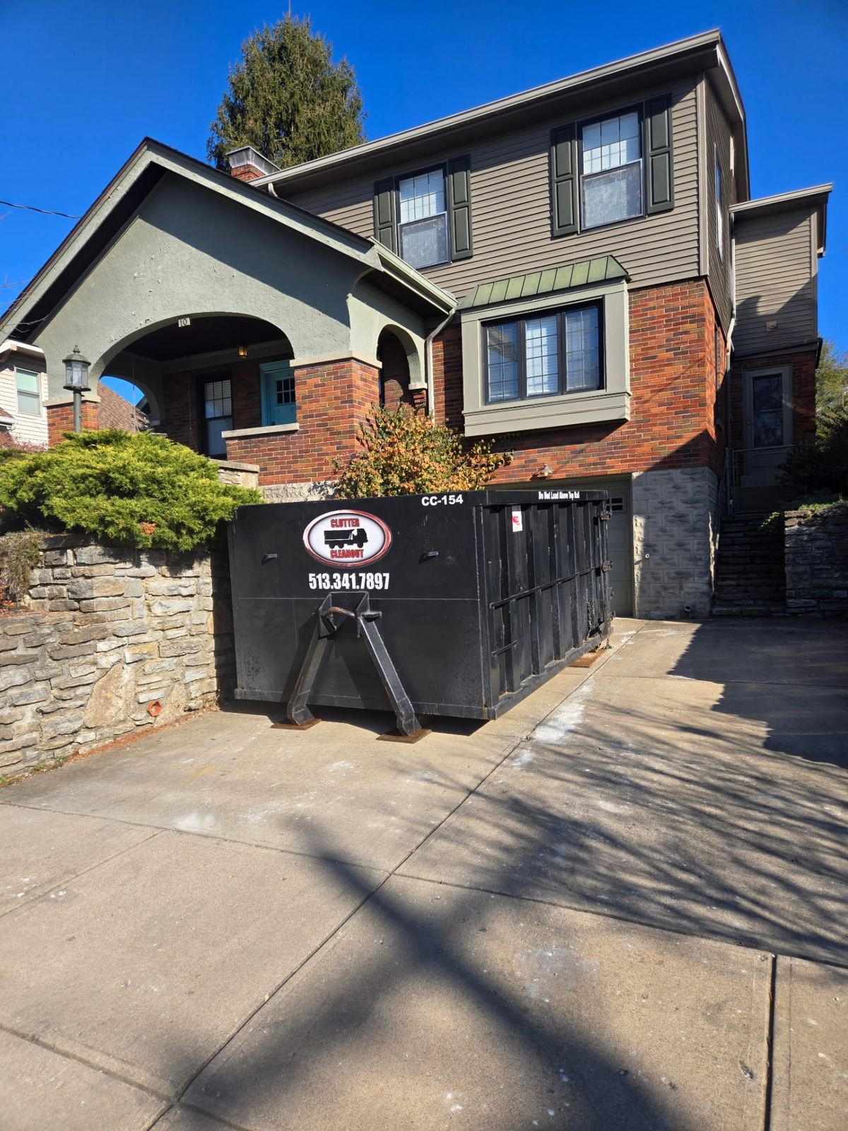 Clutter Cleanout 15-yard dumpster CC-154 delivered to a Mariemont OH home for a garage and basement cleanout
