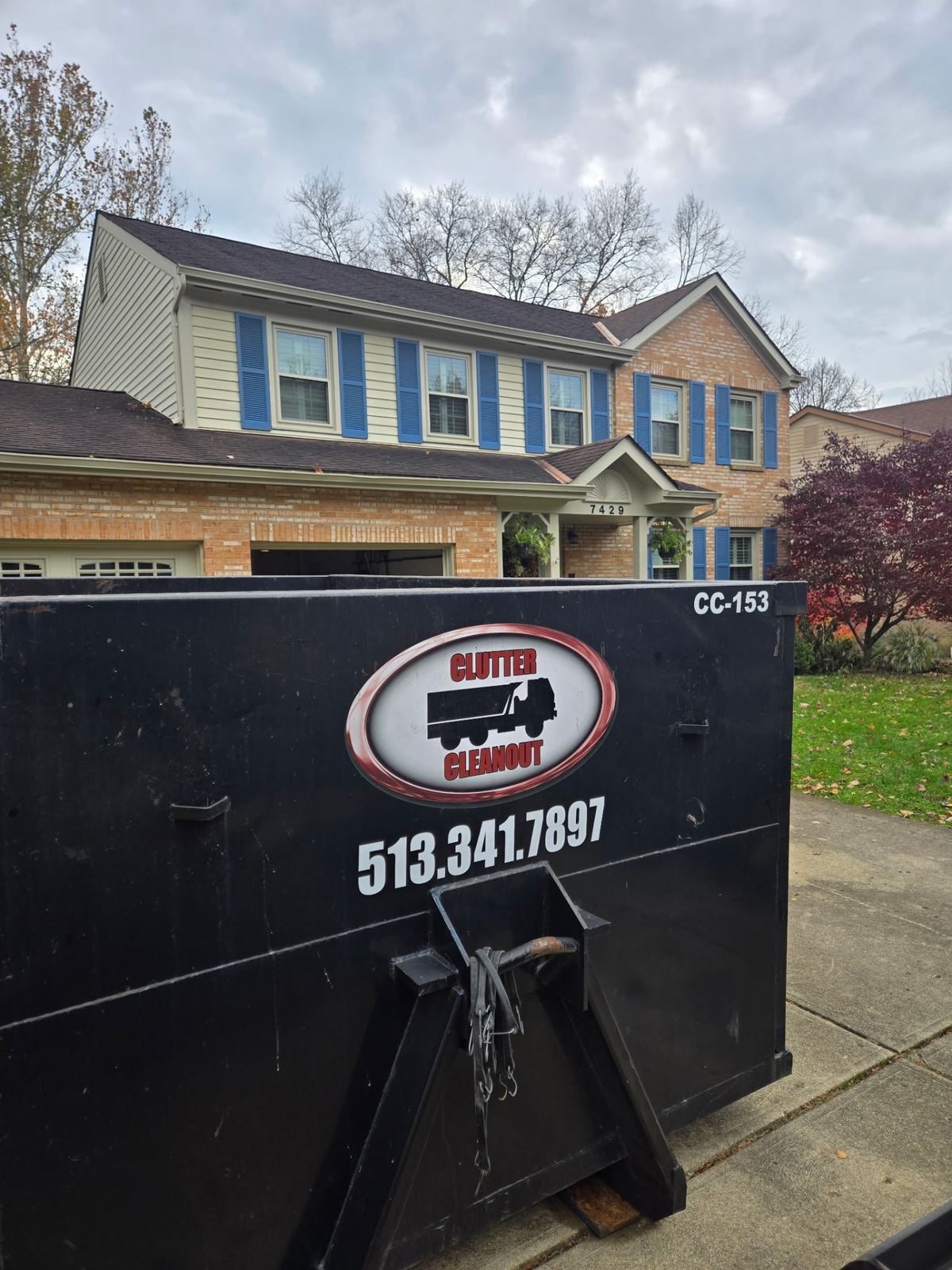 Clutter Cleanout dumpster rental delivered to Union KY home for basement cleanout