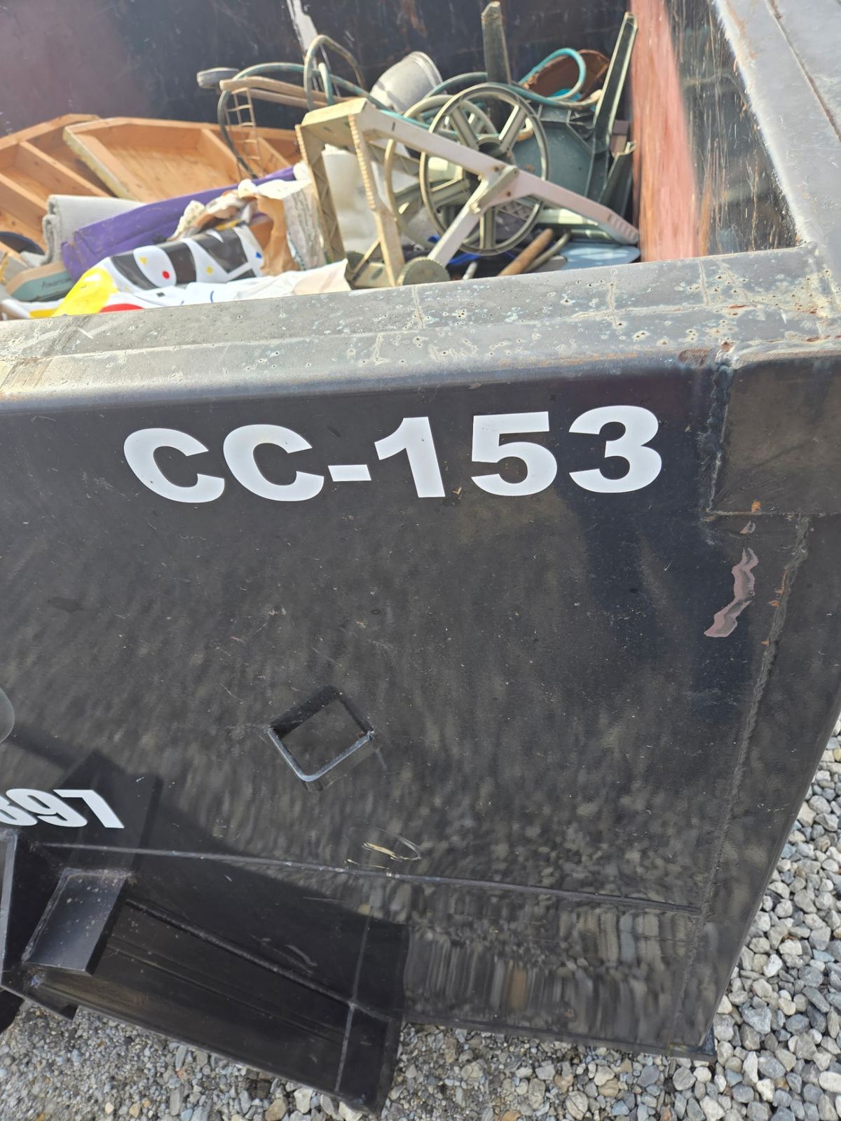 Close-up of Clutter Cleanout dumpster CC-153 in Union KY