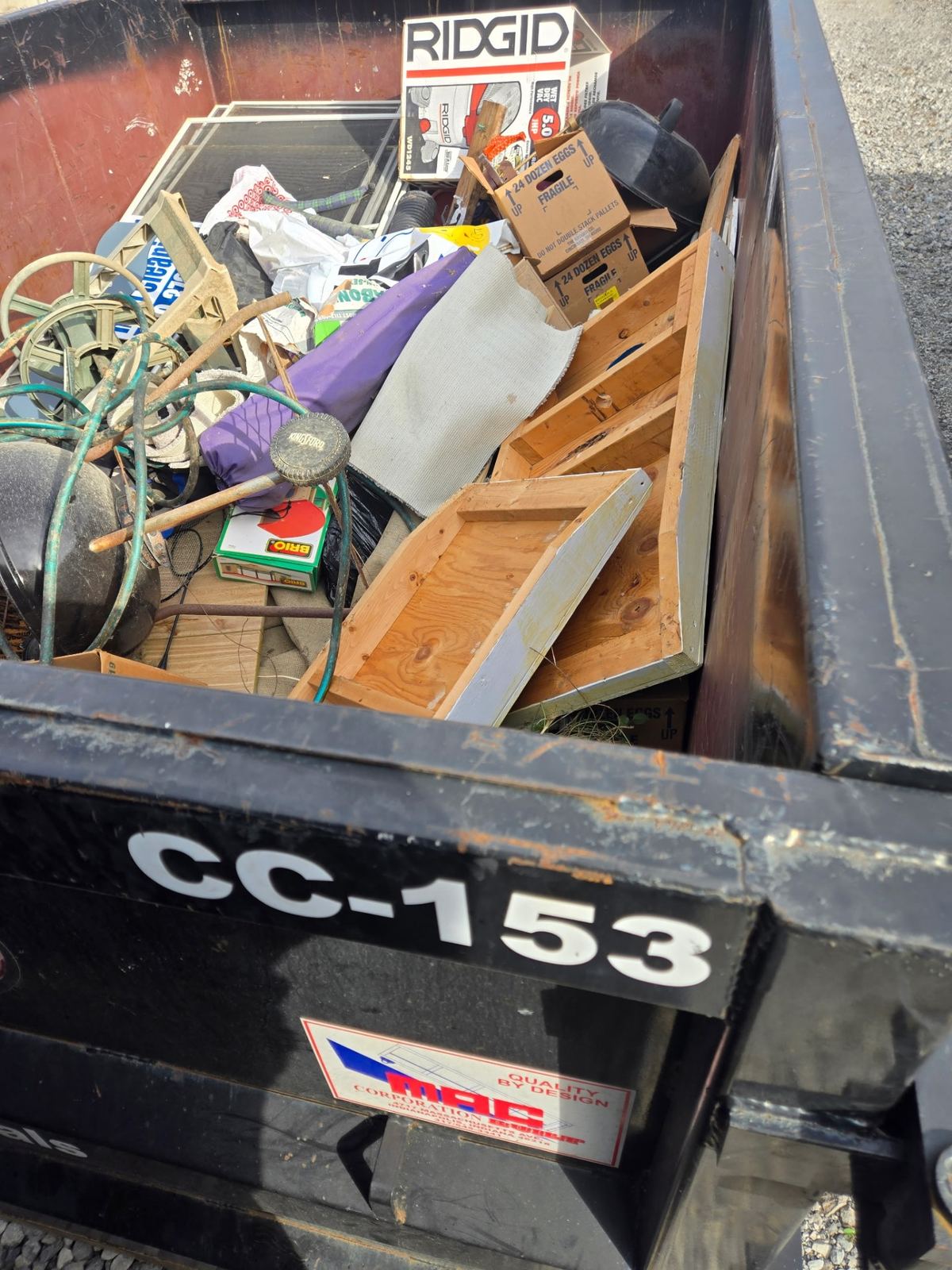 Dumpster filled with household junk from Union KY cleanout project