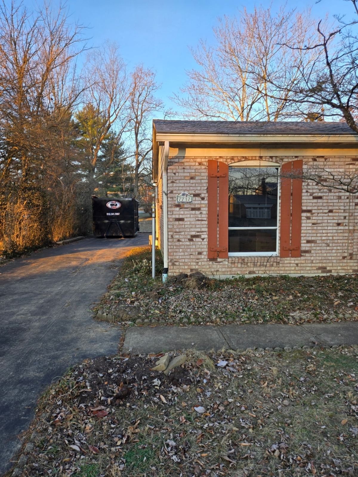 Clutter Cleanout dumpster rental delivered to Villa Hills KY home for deck demolition