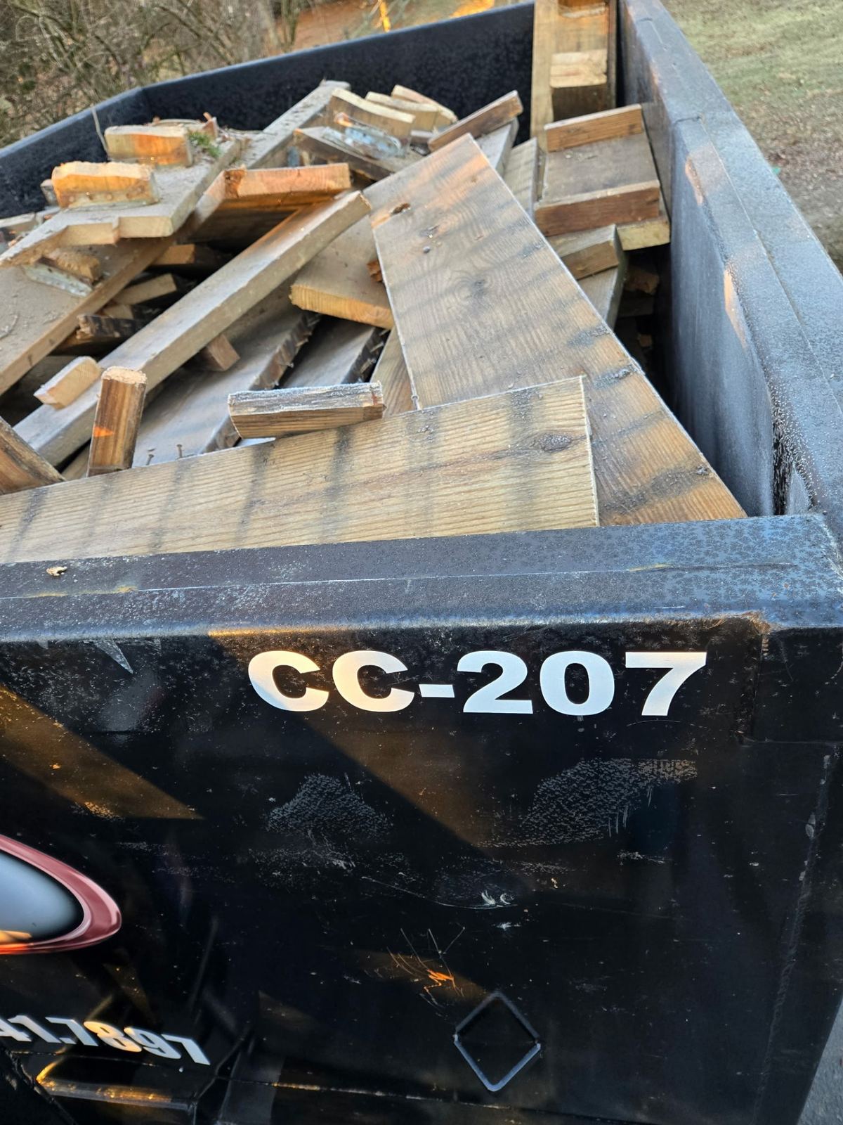 Loaded Clutter Cleanout dumpster CC-207 with wood debris from Villa Hills KY demolition project